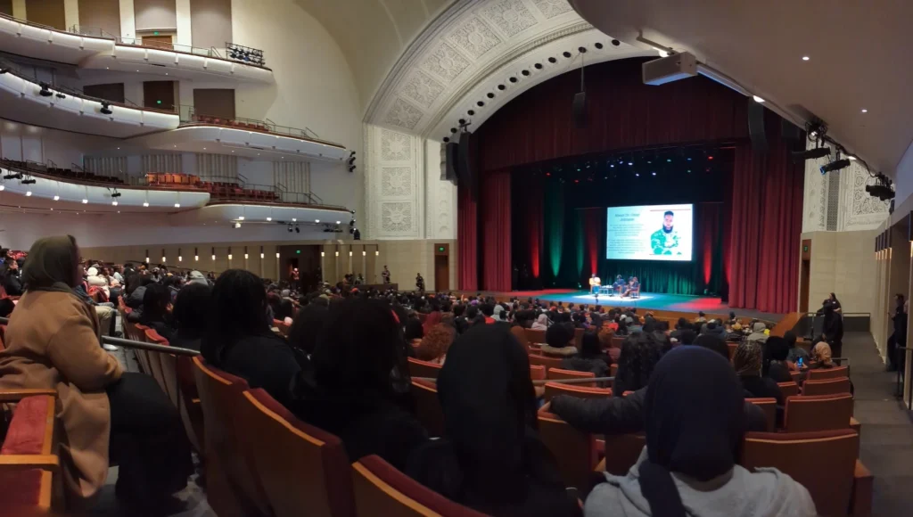 A panoramic image of the crowd at the Dr. Umar Johnson event at the University of Minnesota February 8, 2024